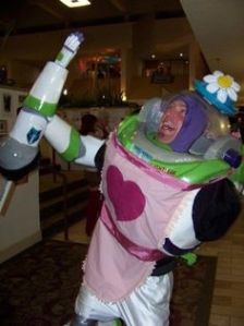 Okay, that's Buzz Lightyear as Mrs. Nesbit at Sid's sister's tea party. And yes, it's hilarious.