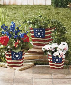 Well, they're made of metal and look quite antique. But they sure have lovely flowers in them.