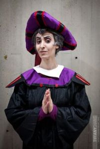 However, he's not because he abuses Quasimodo and lusts after Esmeralda that he makes life miserable for everybody when she rejects him. He's a real nasty piece of work.