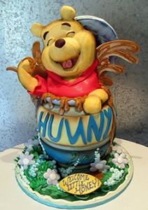 Yes, Pooh is certainly loving this. Cake may be professionally made but it's adorable.