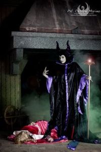 Because Maleficent had to put a curse on her since she wasn't invited to her christening. Now on to capturing Prince Philip.