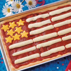 Because it's a flag cheese pizza with mozzarella stick stripes and cheddar stars. And I'm sure it's quite tasty.