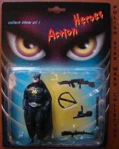 And it seems that Batman has eaten way to much fast food and needs to hit the gym. Also, why does he have firearm accessories?