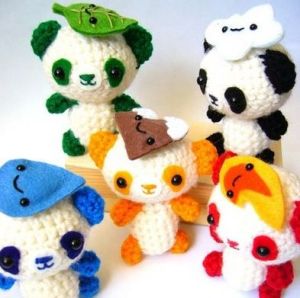 These are the fuwa. Their names are Beibei, Jingjing, Huanhuan, Yingying, and Nini. These translate to "Beijing welcomes you." Too bad, they didn't have one representing air pollution.