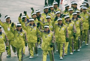 I guess 1980s ski outfits weren't on their way out at this point. And Team South Korea has to parade in PennDOT yellow.