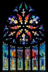 Some church windows might have a lot of abstract imagery like this one. However, the symbols on this one are hard to see from this photo.