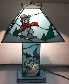 I know it's a Christmas one. But the snowmen on this are so adorable. And most stained glass lamps usually have flowers and shapes on them.