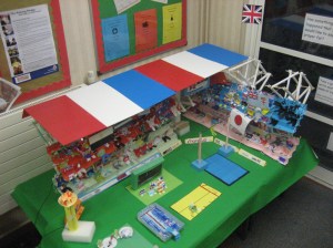 This was also made by the same group of students who did the stadium. And here they're presenting medals.