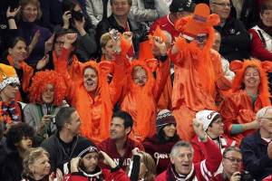 Dutch fans tend to wear a lot of orange and are very easy to identify at international sporting events. They also tend to have a lot of crazy fans.