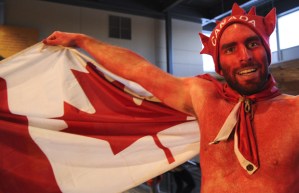 Yes, this guy painted himself to support his Team Canada. And he wears a maple leaf hat to boot.