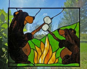 I know Smokey the Bear might not approve of this. But I think it's cute, especially since it has an adult bear and cub.