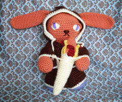 Of course, rabbits don't run with torches. But this is quite adorable. Like the sad eyes.