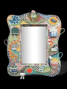 Yes, mosaic picture frames do exist. However, I especially like the little cups on this one. So clever.