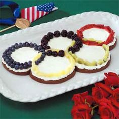 Each Olympic ring on this toast is of a fruit or veggie. And it's all on top of cream cheese.