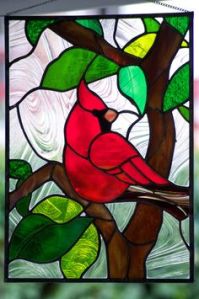 Like ocean life, birds are another popular stained glass motif. The northern cardinal and other backyard birds especially.