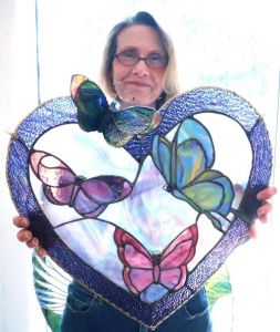 And here this woman stands proud at her creation, I guess. Still, this is so pretty.