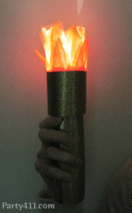 I think this one might use a flashlight. At any rate, the effect is almost the same. Just not with real fire.
