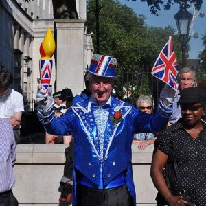 Not sure about a flashy tuxedo though. But I'm sure it's probably a British thing even though Americans might see it akin to Las Vegas.