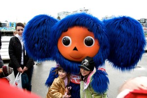 This is supposed to be a Russian cartoon character from the Soviet Era. Really don't have great feeling about what happened to those kids. I don't think he's hugging them.