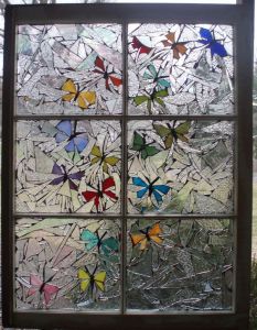 Sure it's a stained glass mosaic. But I said the two tend to go together. Also, you have to admire the butterflies on this.