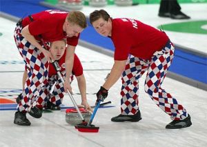 Seems like the Norwegian men's curling team doesn't disappoint. Apparently, they prefer table cloth pants that year.
