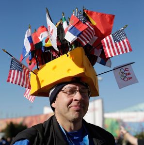 I bet you any money that this guy is from Wisconsin. Because cheese hats are associated with Green Bay Packers fans.