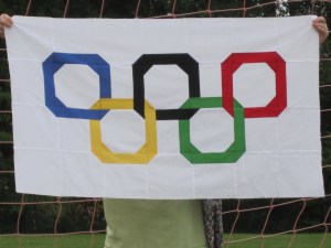 I guess this is another Olympic quilt design. Like how it has a unique spin on the rings. Don't see anything like that every day.