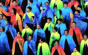 Apparently, it's said that their capes were designed by Lisa Frank. Seriously, Japan, just go with the black outfits and leave the capes at home.