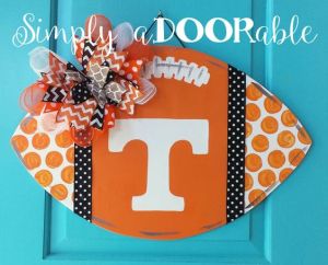 It's in orange and white with polka dot lines. But it's a rather charming football decoration.