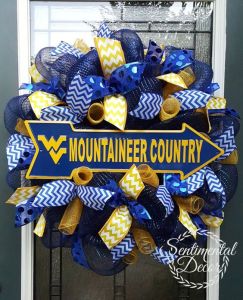 Yes, this is a WVU ribbon wreath. But I think the arrow really makes it work here.