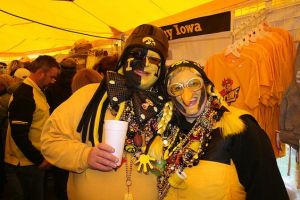 And yes, they dress up in ridiculous costumes together. Like the woman's beak and braids which I think are perfect.