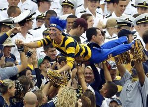 Well, the military branch academies do compete in the NCAA Div. I athletics. But I'm not sure if they count as colleges. Nevertheless, love the blue hair.