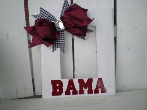 It just has a lovely bow and "Bama." What more can a Tide fan want?