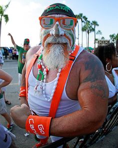 And he's decked in Miami Hurricane colors like a true South Floridian. Even has glasses to match.