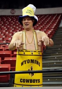 Yes, there's a University of Wyoming and their team is the Cowboys. Yet, their color scheme is different from the NFL Dallas team. So there's nothing to worry about.