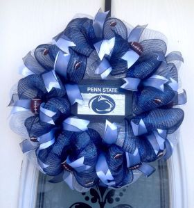 It's deco mesh with ribbons. But it also has a wooden Penn State panel in the center where it counts.