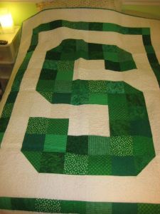 Like how they had a patchwork S. It's in green but has a certain charm to it if you ask me.