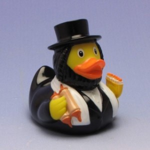 He even has a Torah scroll and menorah in hand. So you don't mistake him for an Amish duck.