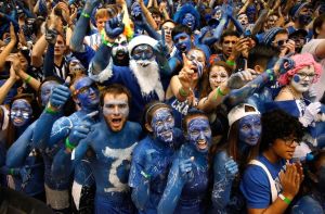 This is a scene from Duke where the fans paint themselves with blue body paint. I know it's ridiculous but it's a tradition.