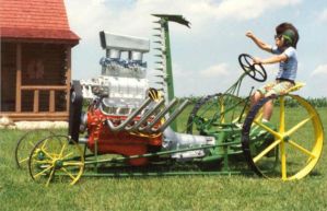 Okay, it's probably more of a piece of DIY farm equipment. But you just have to see the kid on the seat smiling and holding his hand. That's great.