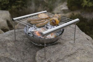 Comes with a tray and fire pit. But it sure looks quite simple to assemble. Doesn't it?