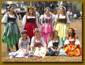 Still, I like how they're wearing the same kind of dress as well as garlands on their heads. Really seems to bring out a good effect here.