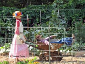 But the guy gets the ride while the woman has to push him around. Love the flower hat though.
