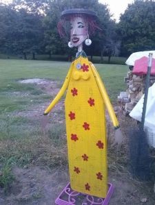 Well, she's made with an ironing board. But yes, she seems a bit flat and stiff.