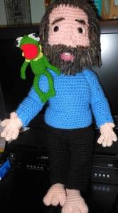 And here he is with a crocheted Kermit at his side. Because Kermit is his first Muppet and signature character.