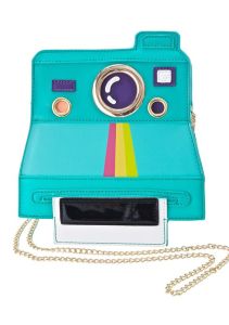 I call these type of cameras Polaroids because that's the company that made the best known ones. But I understand Polaroid makes normal looking cameras as well.