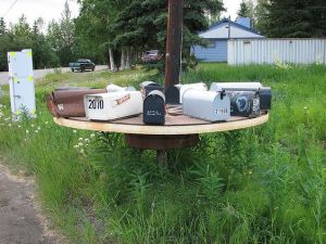 That way, the mail carrier can just spin the wheel to deliver the mail instead of having to stop their truck constantly. Seems more convenient to them.