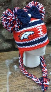 It's even shaped as a football as well as has a bow and pom poms. So cute.