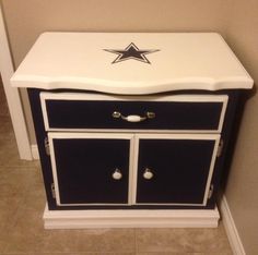 Yes, this is a cabinet painted in Dallas Cowboy colors. Lovely color scheme but keep it away from my dad.