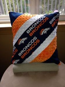 This one uses Broncos, white, orange, and blue. Some of the material might be fuzzy according to the picture.